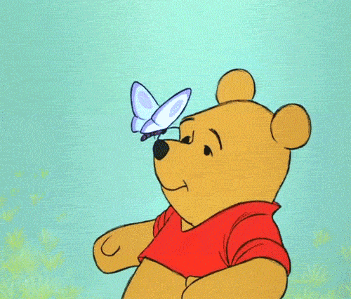Winnie the Pooh blowing away butterfly animated GIF