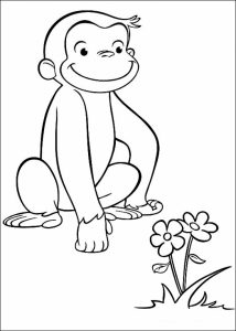 Curious George looking at flower